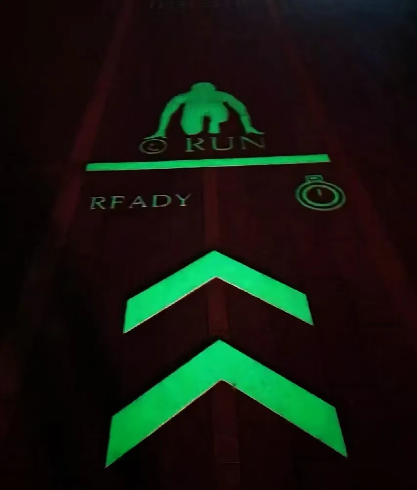 Green luminescent coating graphic after dark