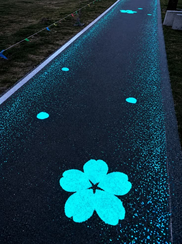 Glow Stone Pathway with Luminous Floral Design